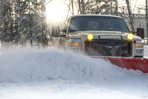 Plowing at Brockway's Adriondack Style Homes